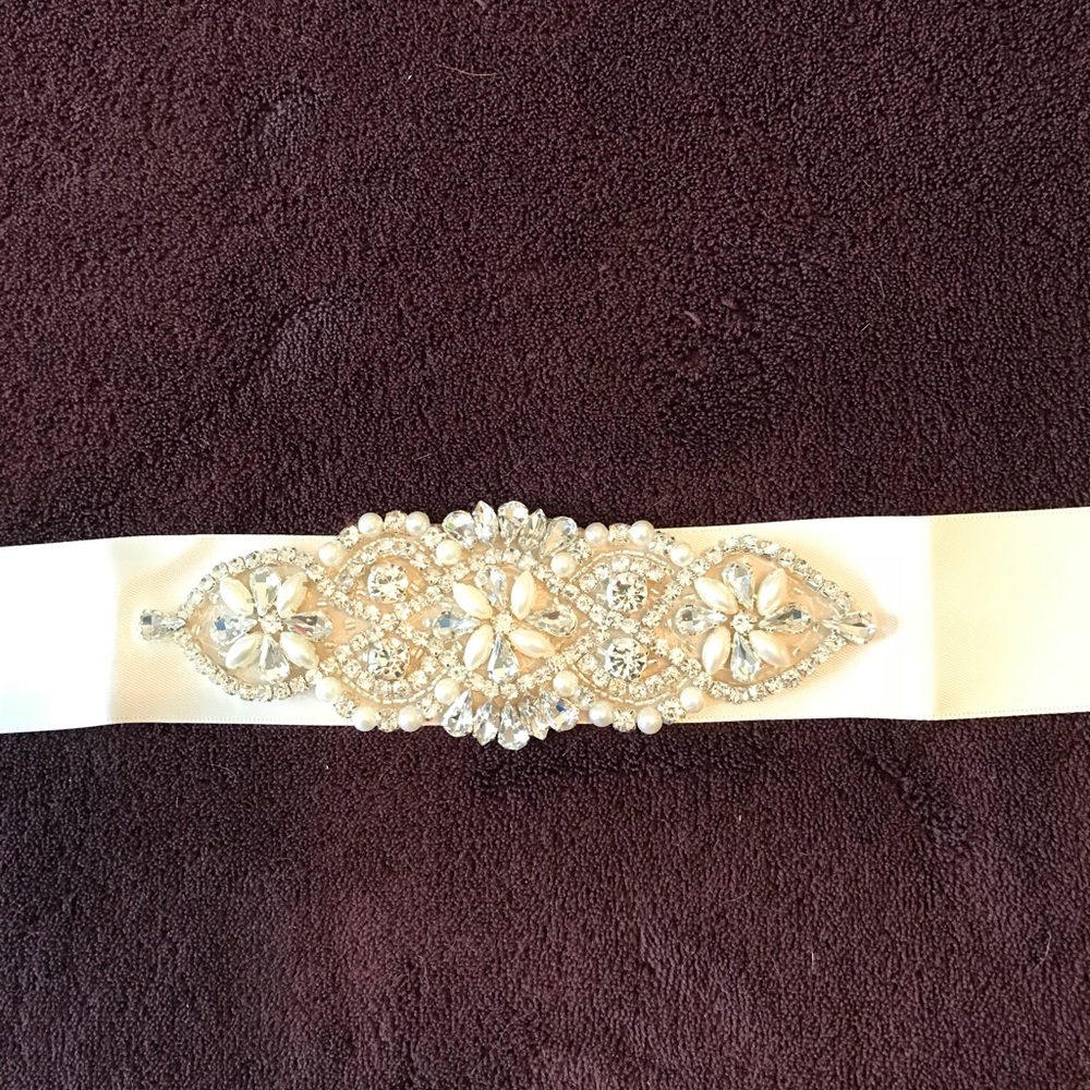 Ivory crystal sash never worn